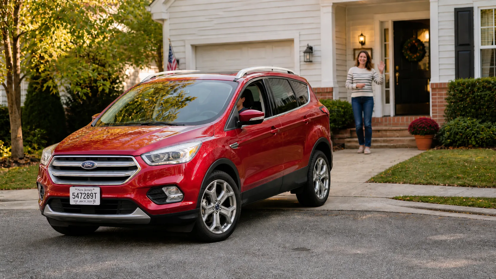 New owner with their vehicle parked in the driveway ready to drive away